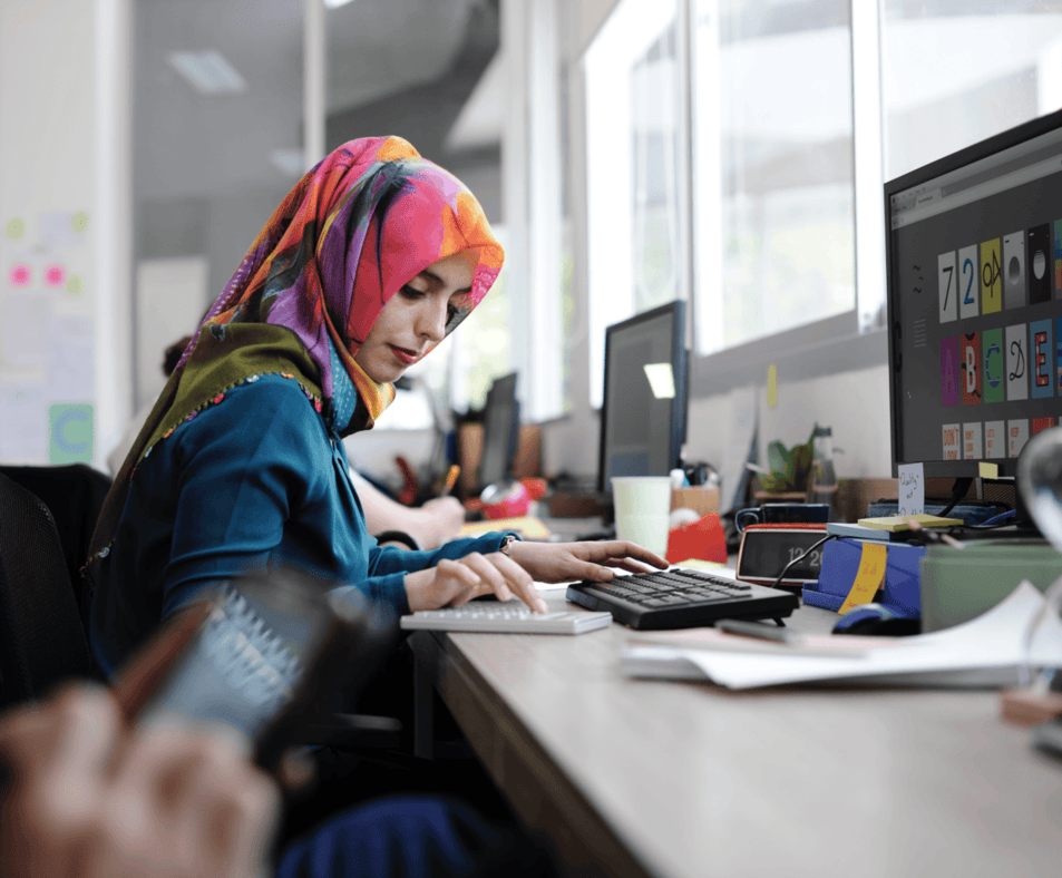Malay woman using HR software